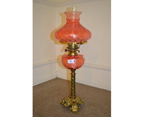 Victorian gilt brass and ruby glass oil lamp