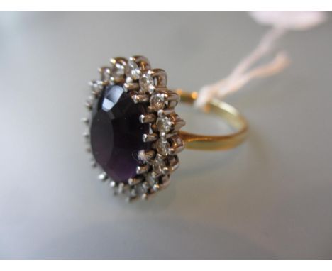 18ct Gold and platinum oval amethyst and diamond cluster ring