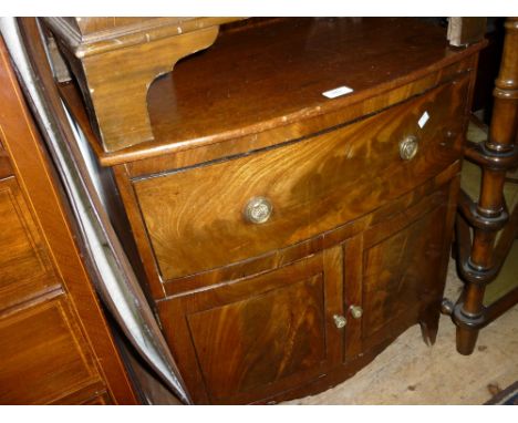 19th Century mahogany bow front commode, the plain top above a single drawer with brass ring handles and two black line inlai