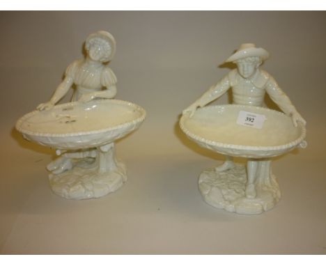 Pair of Hadley Worcester figures of boy and girl with baskets (damages)