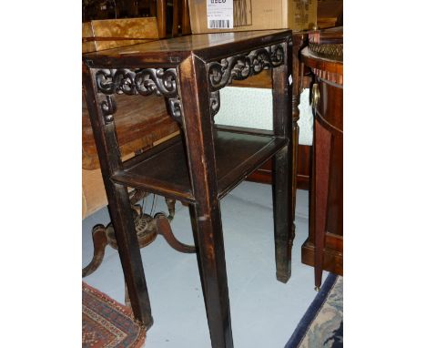19th Century Chinese hardwood lamp table, the rectangular top above a pierced frieze on square cut supports with undertier