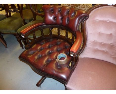 Red leather button upholstered swivel office chair