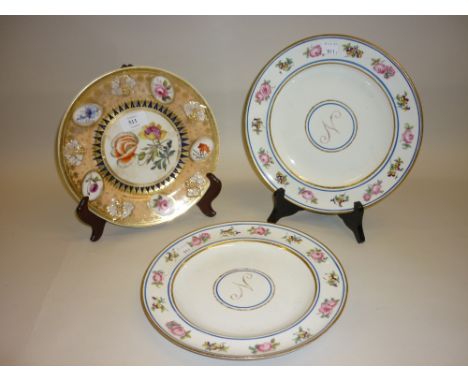 Pair of early 19th Century Chamberlain Worcester floral decorated plates, the centre with monogram N. together with another 1