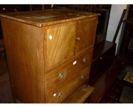 19th Century mahogany commode chest with two doors above two drawers on bracket supports