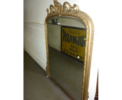 Large 19th Century gilt framed overmantel mirror having C-scroll and shell surmount on ceramic bun feet, 52ins x 58ins