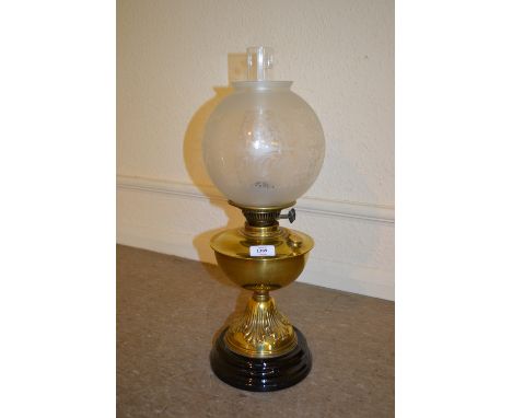 Victorian brass oil lamp with etched glass shade and glass chimney