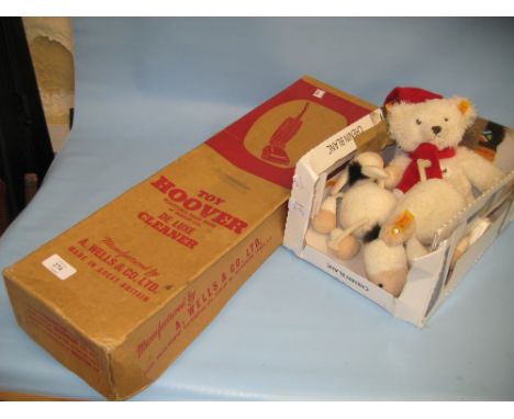 Wells & Co. childrens Hoover in original box, together with a Steiff teddy bear and two Steiff lambs