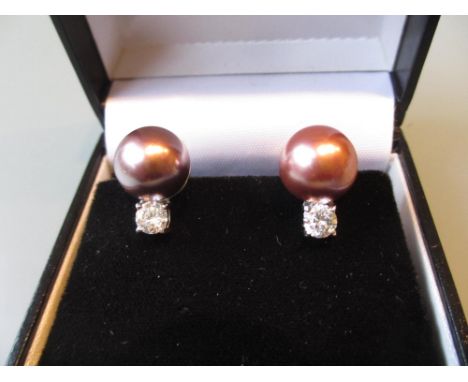 Pair of silver mounted simulated pearl and white stone ear clips