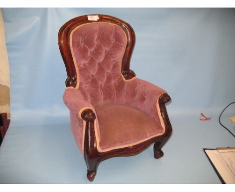 Reproduction mahogany button upholstered spoon back dolls armchair