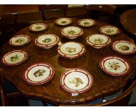 19th Century Worcester fourteen piece dessert service painted with specimens of various fruits within a cerise and gilt borde