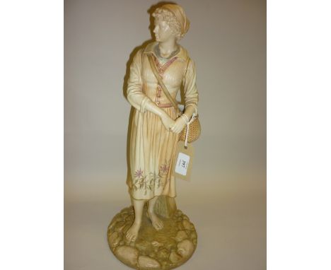 Large Hadley Worcester blush ivory figure of a standing girl carrying a wicker basket, 16.5ins high