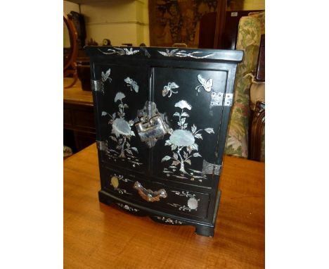 Oriental black lacquer and mother of pearl inlaid table cabinet with two doors above a single drawer