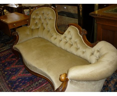 Victorian button upholstered chaise longue, the carved shaped walnut frame raised on cabriole front supports