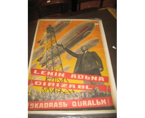 Similar Russian lithograph propaganda poster depicting Lenin before an airship fleet bearing a different message in red bands