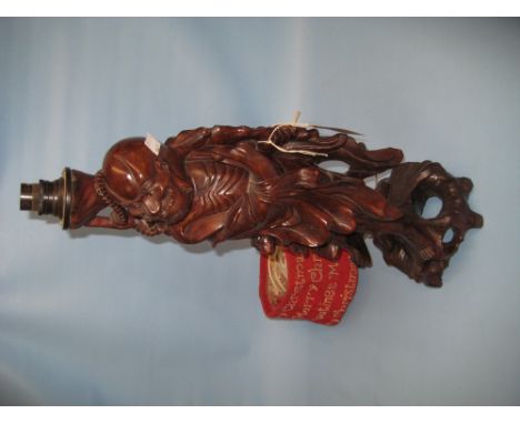 Chinese carved hardwood figural lamp base in the form of a sage, 21ins high