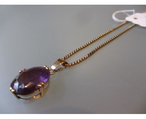 9ct Gold amethyst set pendant on a 9ct gold chain