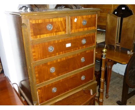 Reproduction mahogany bedroom chest having two short and three long drawers raised on bracket feet