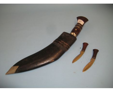 Gurkha kukri with leather scabbard and two matching smaller knives