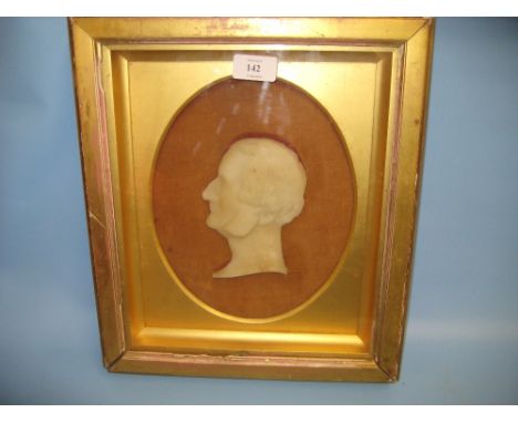 19th Century relief moulded wax profile portrait of a gentleman, gilt framed