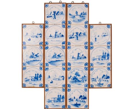 A set of sixteen Dutch blue and white delftware tiles in four frames, painted with estuary and river views with figures and b
