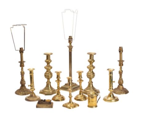 A collection of mixed brass domestic wares includes;- table lamps, candlesticks, inkwell and flour dredger (a lot)