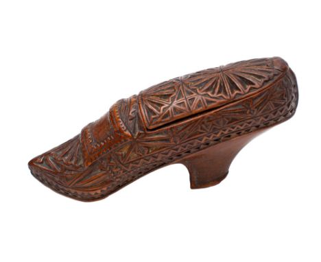 A yew wood treen shoe snuff box and cover, late 18th/early 19th century in the form of a lady's buckle shoe, carved with oval
