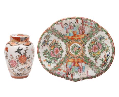 A Chinese Canton famille rose shell dish and a Japanese tea caddy with inner and outer covers the dish painted with panels of