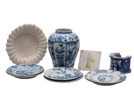 A mixed lot of Dutch and English blue and white delftware and other tin-glazed pottery including a lobed jar painted with pan