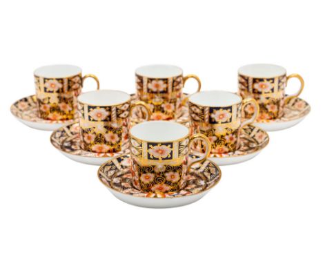 A mixed group of Royal Crown Derby, comprising an Old Imari coffee cup and saucer and matching can and saucer, two small vase