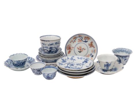 A collection of Chinese blue and white wine-cups/teabowls and saucers, Kangxi varied decoration, some pieces with character o