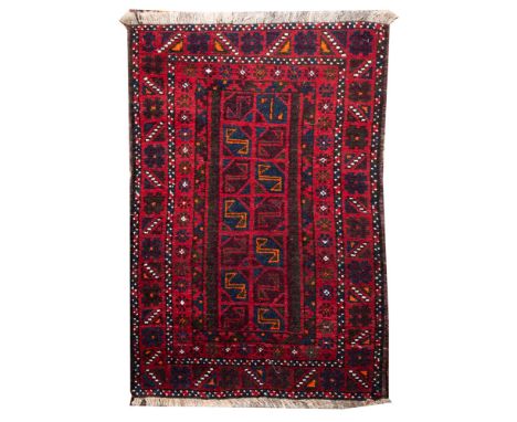 An Afghan Turkoman rug, the brick red rosette and lozenge lattice field enclosed by a multiple border, 122cm x 78cm, an Afgha