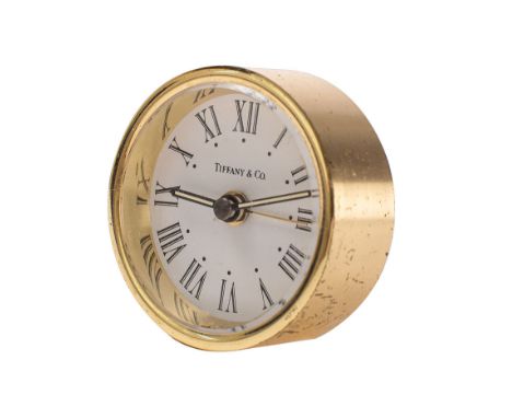 A Tiffany travel alarm clock the white dial signed Tiffany & Co with Roman numerals, baton hands and alarm setting hand, the 