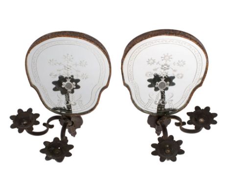 A pair of Continental, probably Venetian twin light girandoles, early 20th century; each with twin metal sconces with petal c