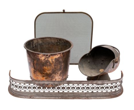 Four items of domestic hearth metalware, 19th and 20th century; comprising a Victorian riveted copper basin, now utilised as 