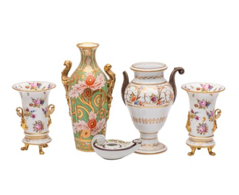 A pair of early 19th century vases in Swansea style and three other items the vases with flared rims and satyr mask and folia