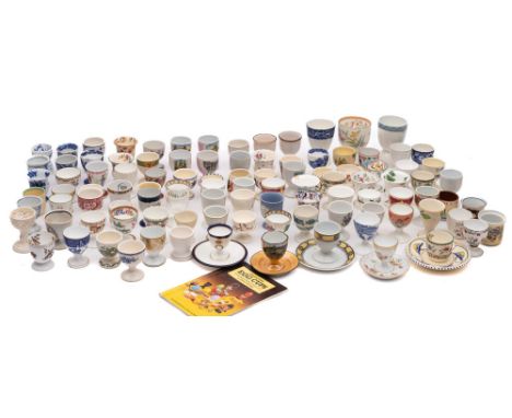 An extensive collection of ceramic egg cups, some 19th/ the majority 20th century,  approximately 100.