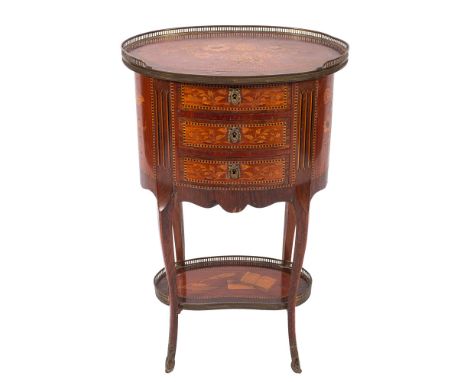 A late 19th Century French rosewood, mahogany and floral marquetry oval gueridon, bordered with chequer lines and decorated w