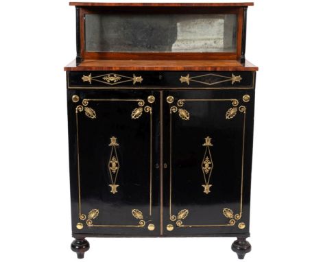 A Regency ebonised, satinwood and rosewood banded chiffonier, early 19th century; the upper shelf above a mirrored backplate 