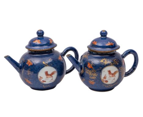 A pair of Chinese porcelain miniature teapots and covers, each painted in rouge-de-fer and gilt with cockerels, flowers and b