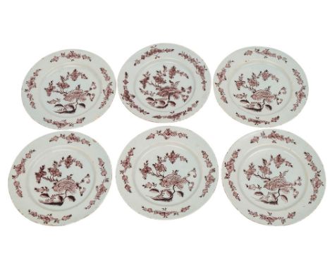 A set of six Dutch delftware plates, each painted in manganese in the Chinese manner with peony, other blooms and foliage, pa