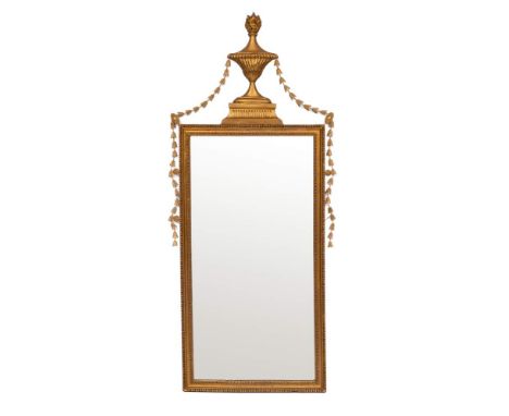 A giltwood and composition framed pier mirror in Adam style, 20th century,: the flambeau urn finial swagged with bellflowers 