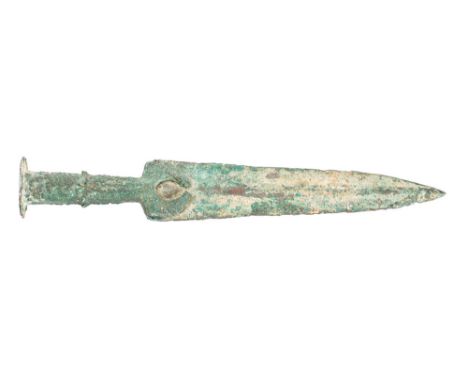An archaic Persian bronze dagger with ridged blade and crescent guard, 29cm.