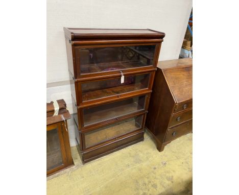 A Globe Wernicke mahogany four section bookcase, width 87cm, depth 27cm, height 141cm