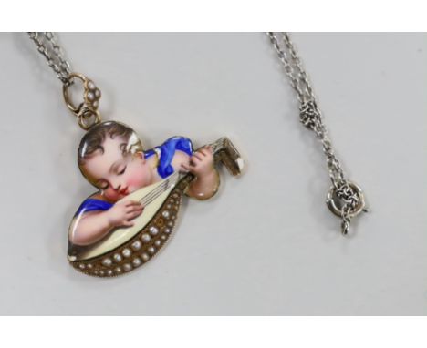 A continental yellow metal and enamel pendant, depicting a child with mandolin, 34mm, on a white metal and seed pearl chain, 