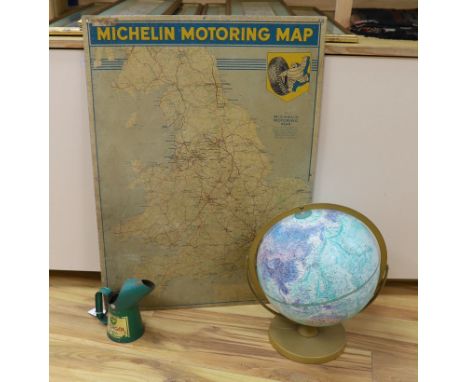 A BP oil can, Michelin motoring map and a revolving globe.