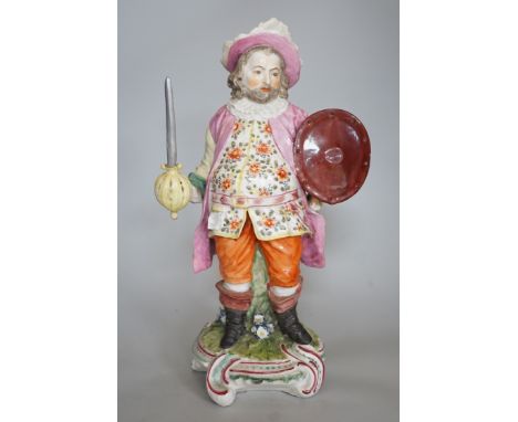 A large Derby figure of Falstaff standing, holding a sword and shield, patch marks, original brass sword, is now a modelled r