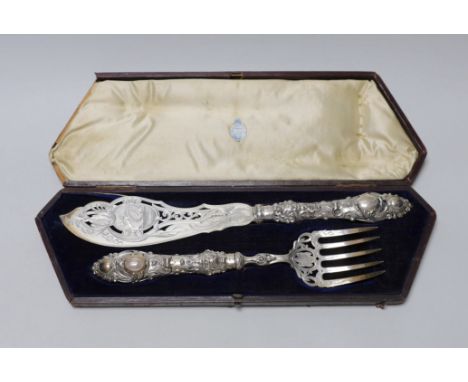 A cased pair of ornate Victorian silver fish servers, Martin, Hall &amp; Co, Sheffield, 1856, knife 35.8cm.