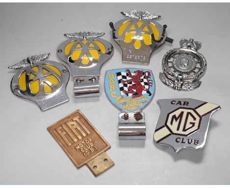 Seven car badges: Fiat motor club, British automobile racing club, MG club, the automobile club and three AA badges