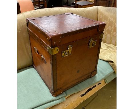 A Victorian style brass mounted tan leather trunk, length 47cm, depth 46cm, height 50cm