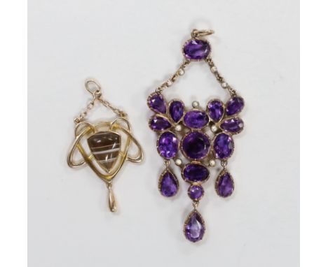 An early 20th century Art Nouveau 9ct and band agate set drop pendant, 37mm and a similar amethyst and seed pearl cluster set